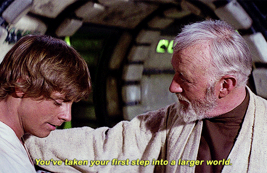 Obi-wan Kenobi talking to Luke Skywalker saying, 'That's good, you've taken your first step into a larger world'.